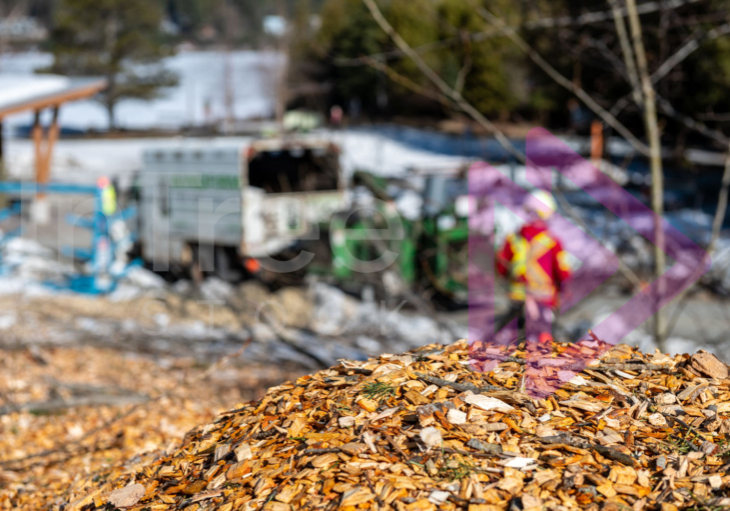 Fresh woodchip with chiptruck in background