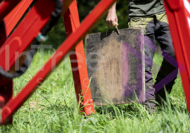 Outrigger pad in ground persons hand